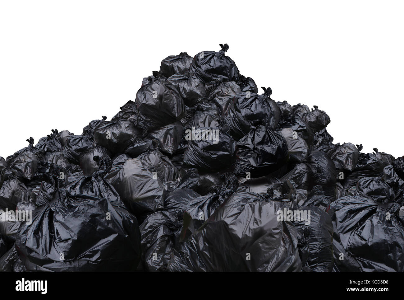 Garbage dump isolated on a white background as a pile of black plastic trash bags. Stock Photo