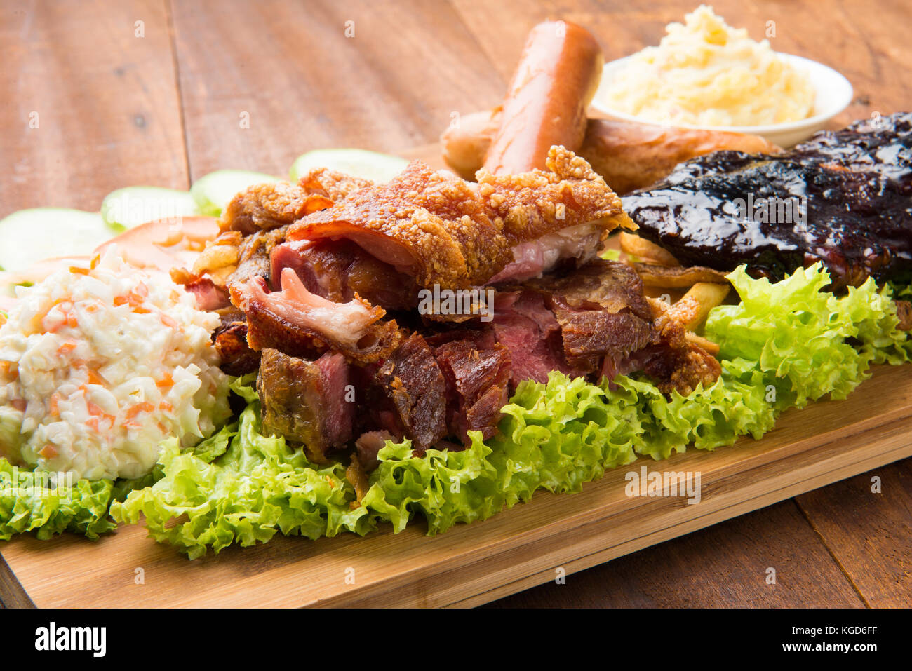 Knuckle Ribs roasted pork knuckle ribs ,sausage and mash potatoes Stock Photo - Alamy