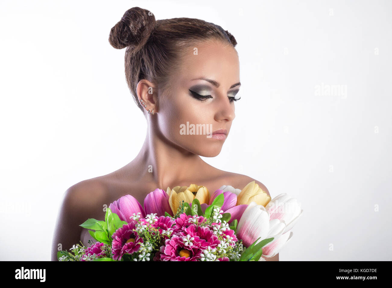 beauty woman with spring flowers studio Stock Photo - Alamy