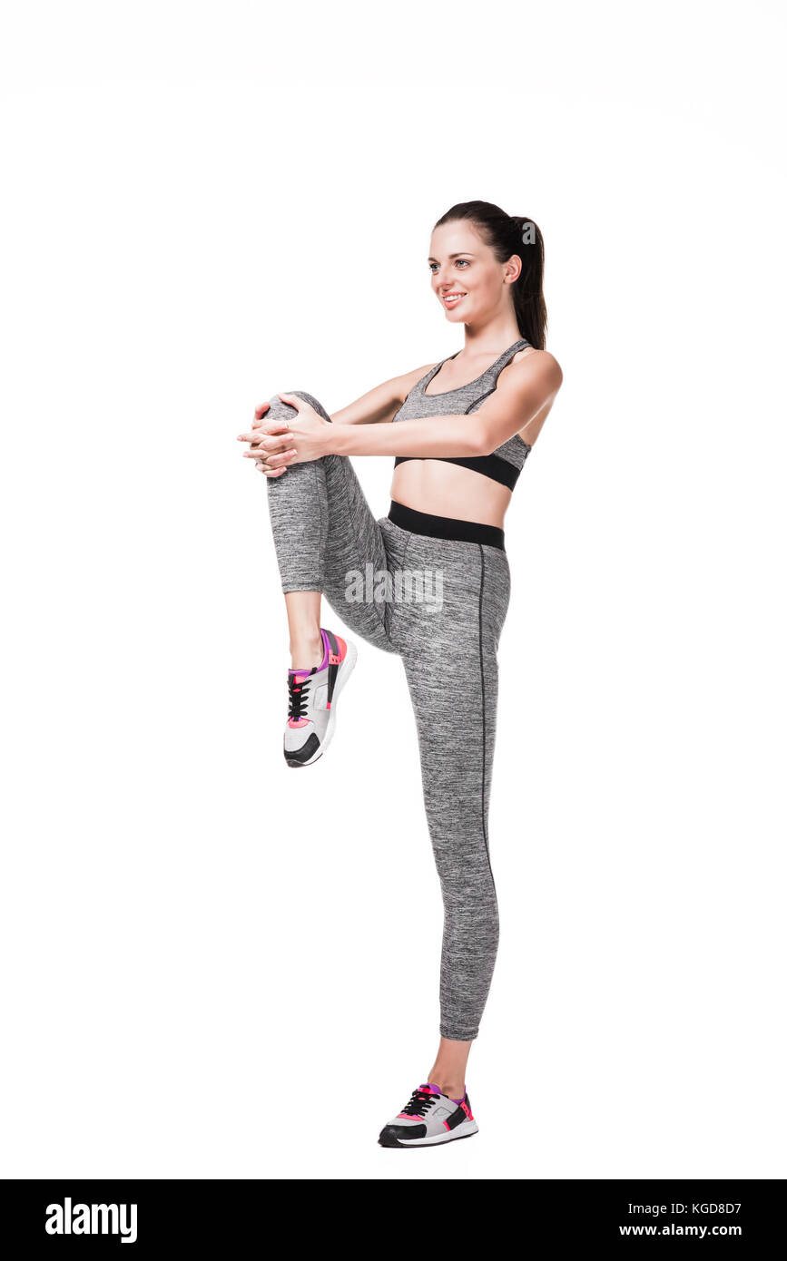 sporty woman stretching legs Stock Photo - Alamy
