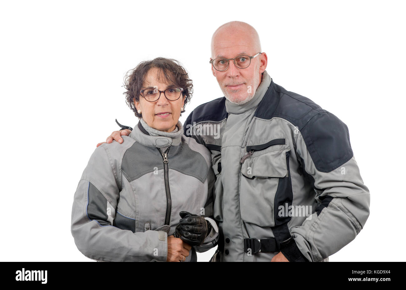 a couple senior riders  isolated on the white background Stock Photo