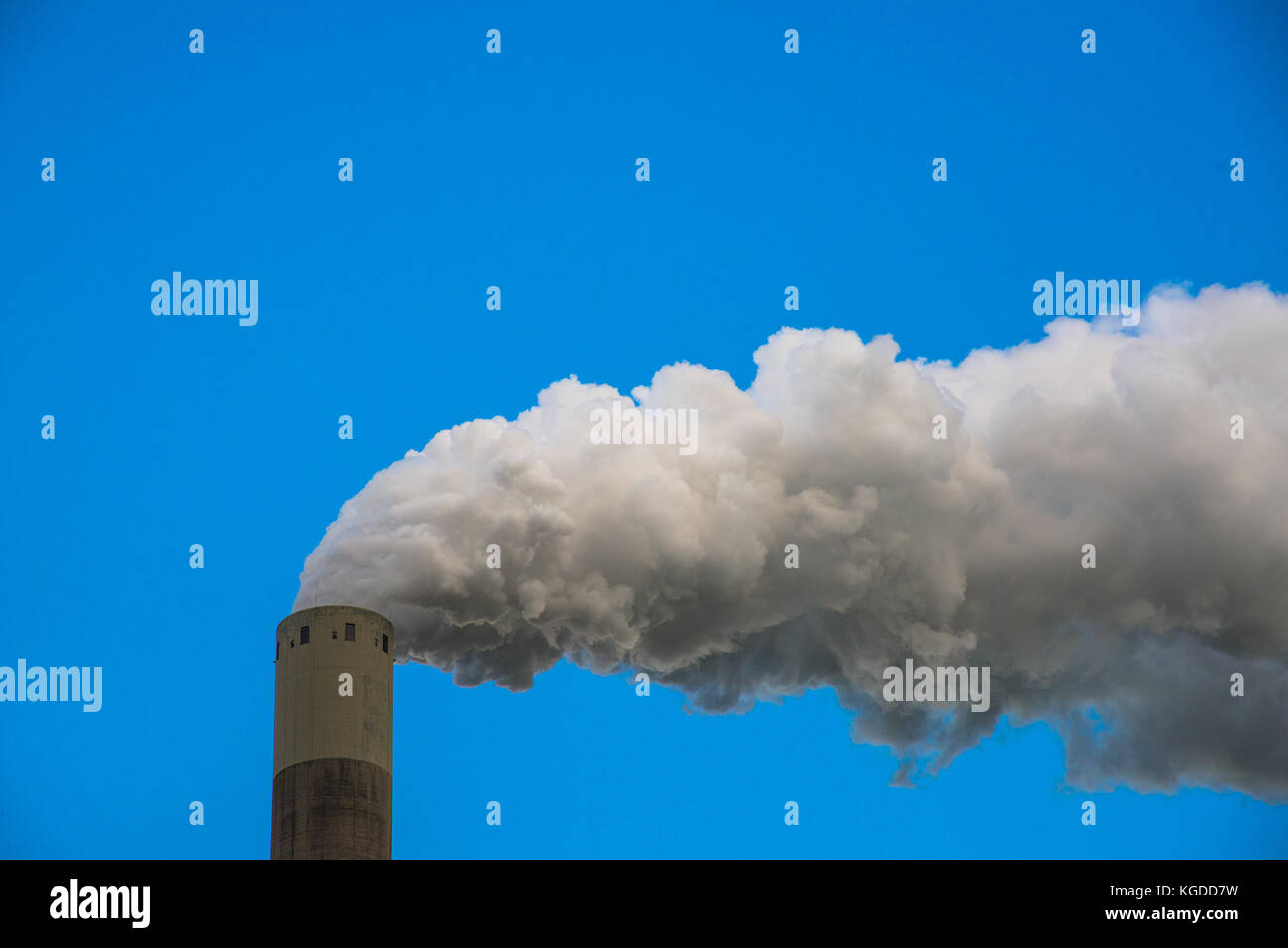 chimney from powerplant with white smoke and blue sky Stock Photo - Alamy