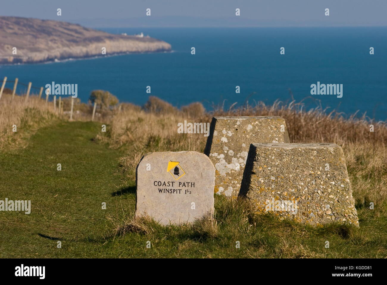Stone Coastal Path sign at St Albans Head,Looking to Anvil Point Lighthouse,Worth Matravers,Dorset Stock Photo