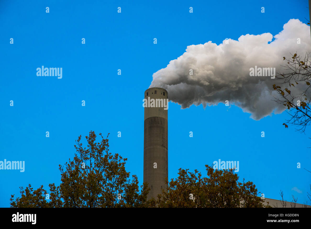 chimney from powerplant with white smoke and blue sky Stock Photo - Alamy