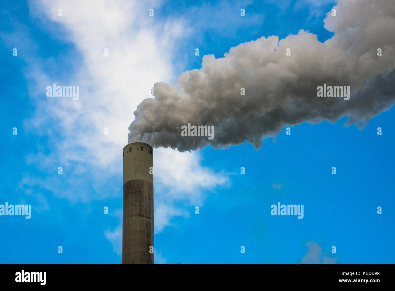 chimney from powerplant with white smoke and blue sky Stock Photo - Alamy