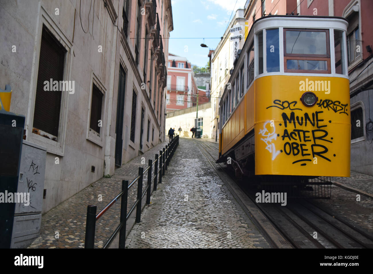 Tram going up on the streets in Lisbon Stock Photo