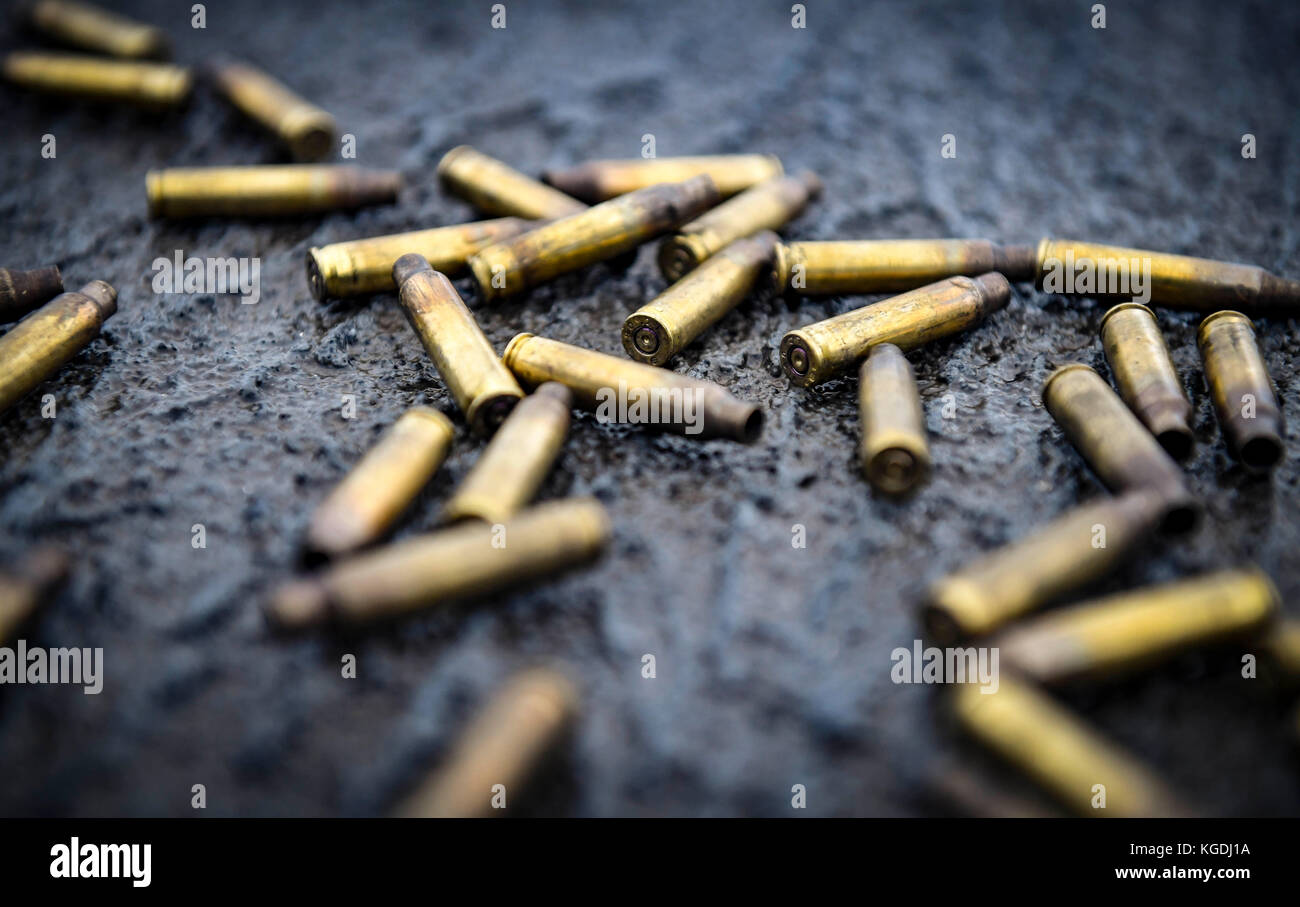 Expended ammunition, fired from an M16 rifle during a weapons qualification course, lays on the flig Stock Photo