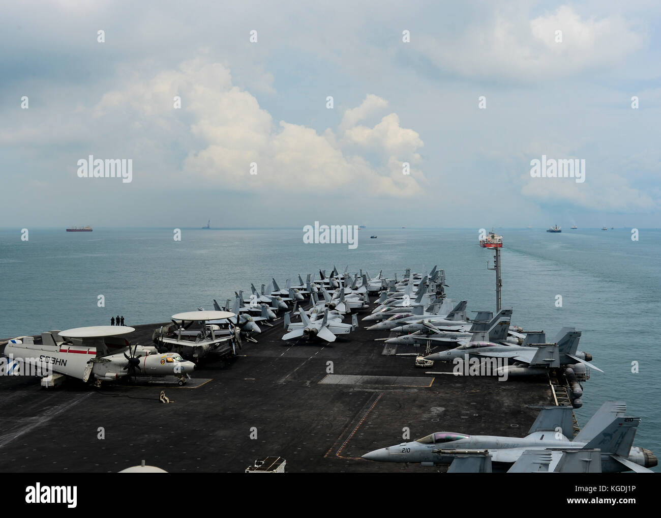 The aircraft carrier USS Nimitz (CVN 68) transits the Singapore Strait. The Nimitz Carrier Strike G Stock Photo