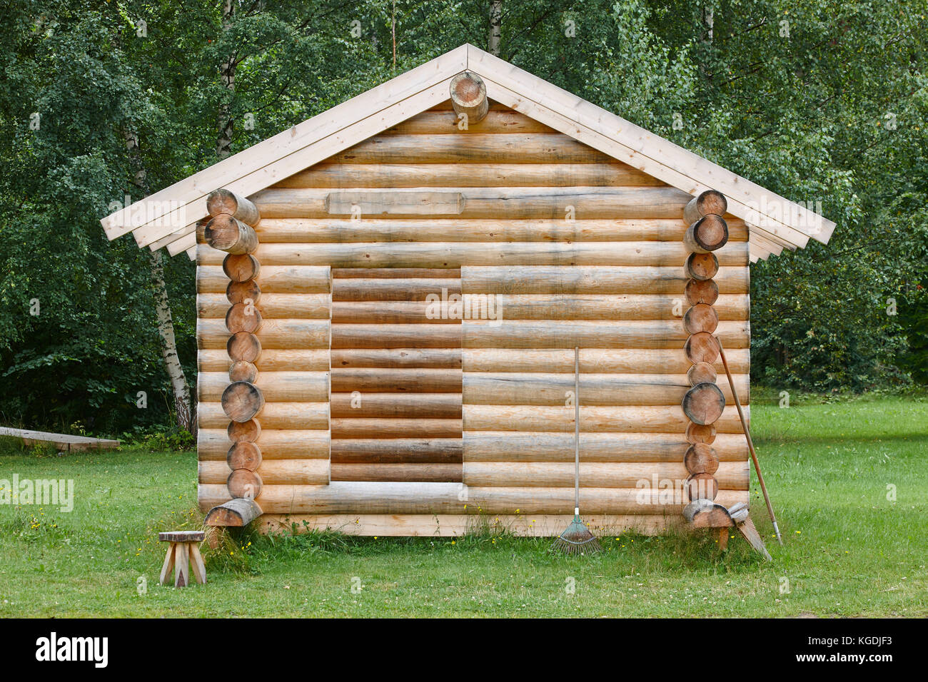 Wooden Cabin In The Forest Under Construction Raw Materials