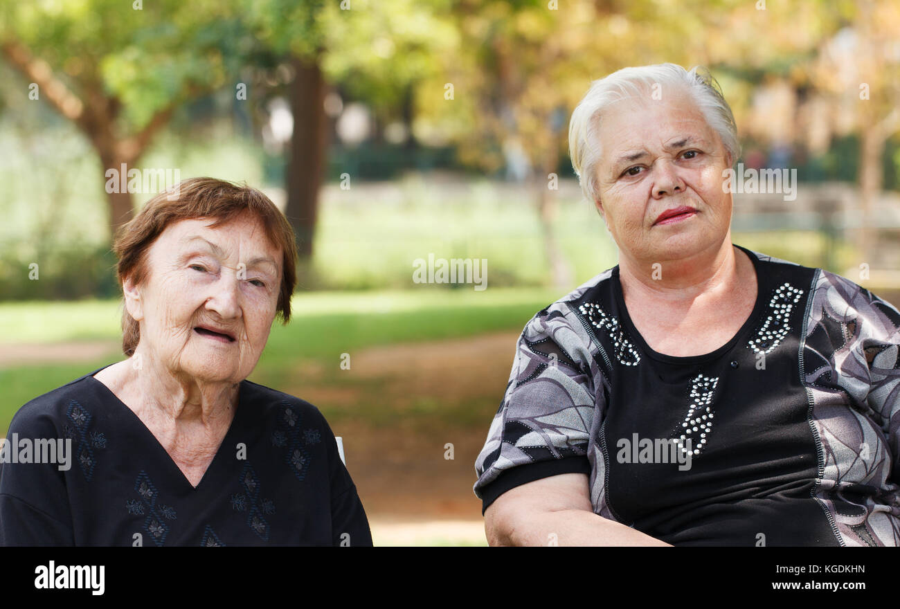 Two grandmothers outdoors Stock Photo