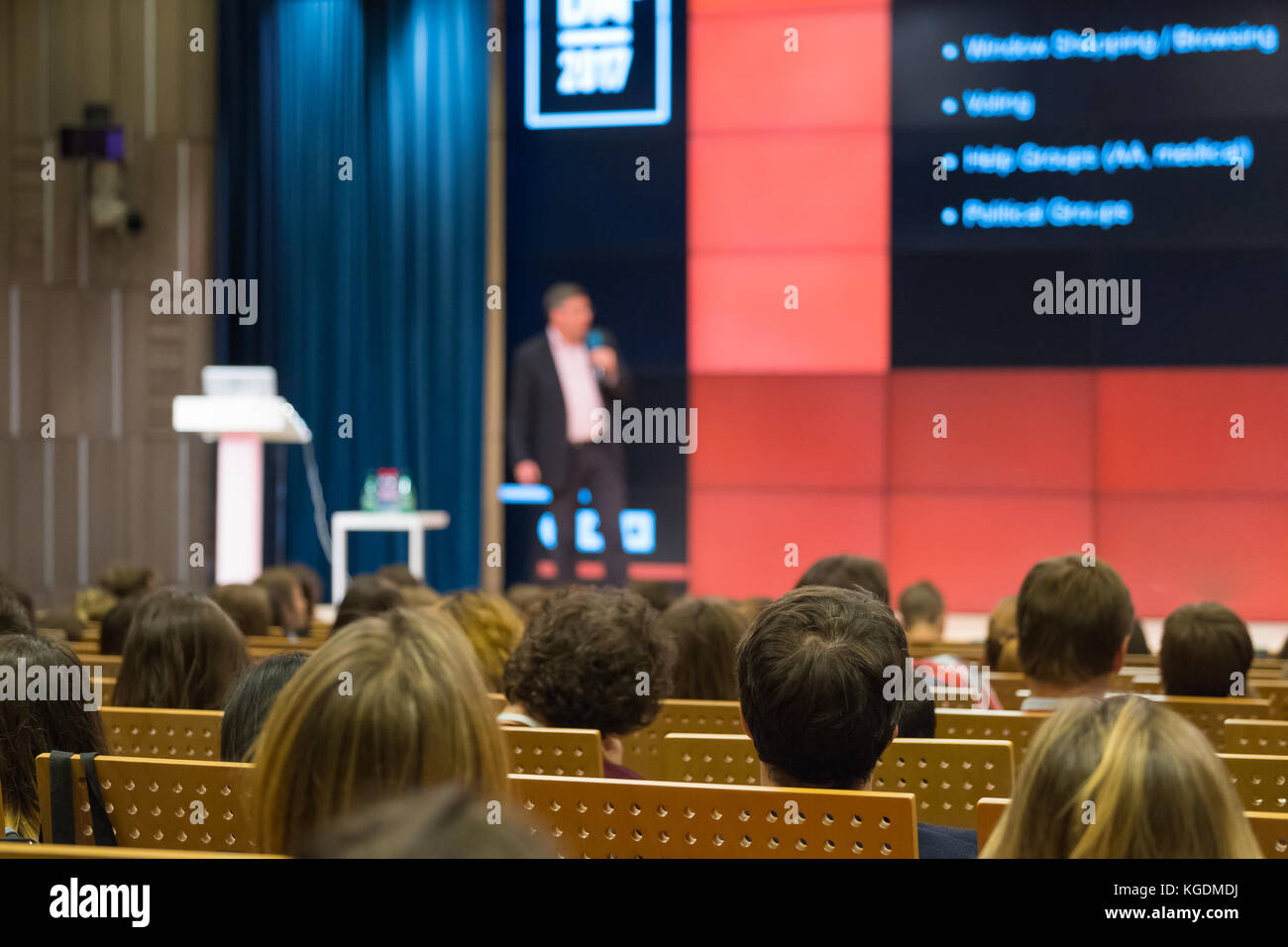 Audience listens to the lecturer Stock Photo - Alamy