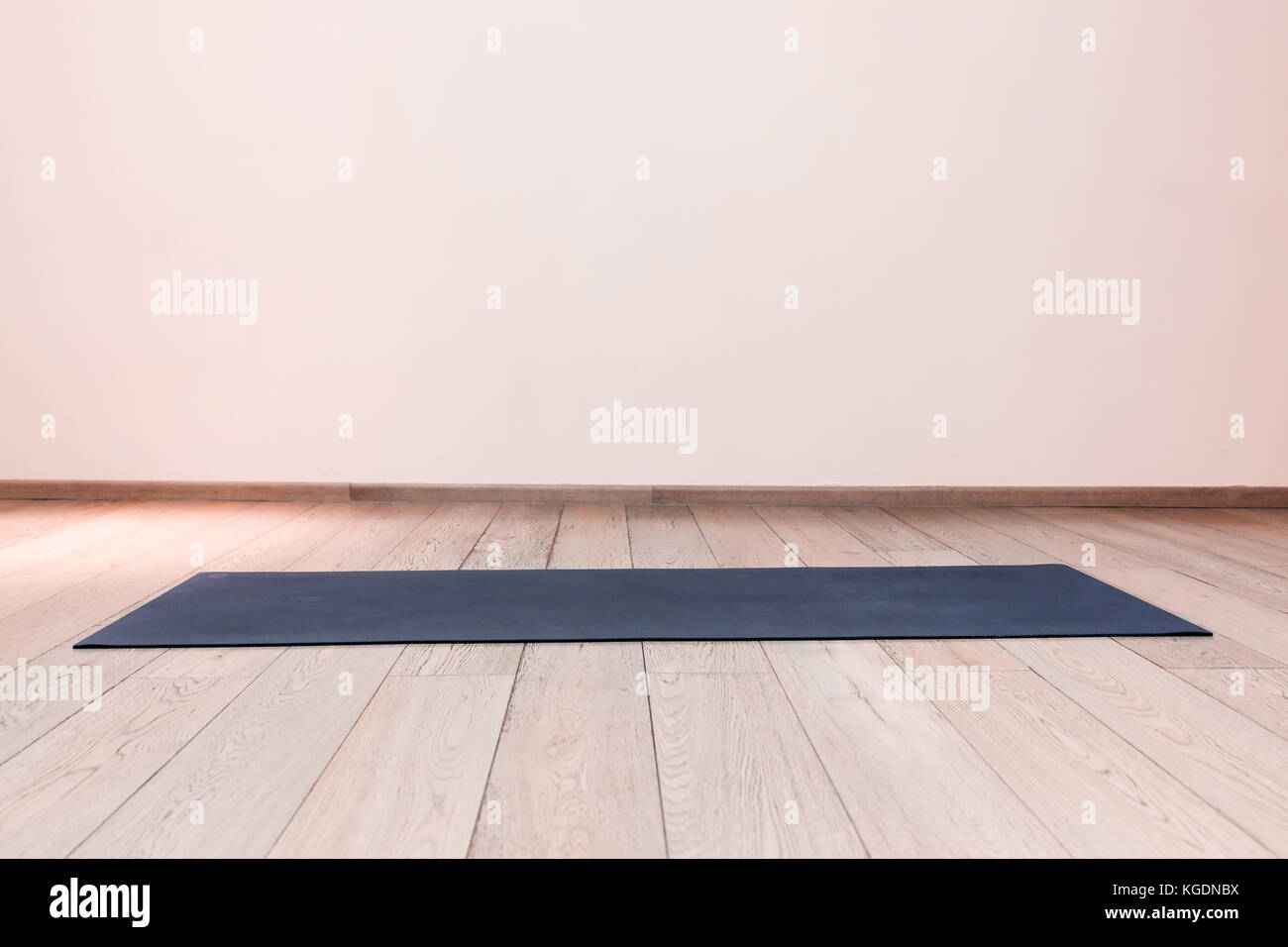 Gym with yoga mat interior Stock Photo