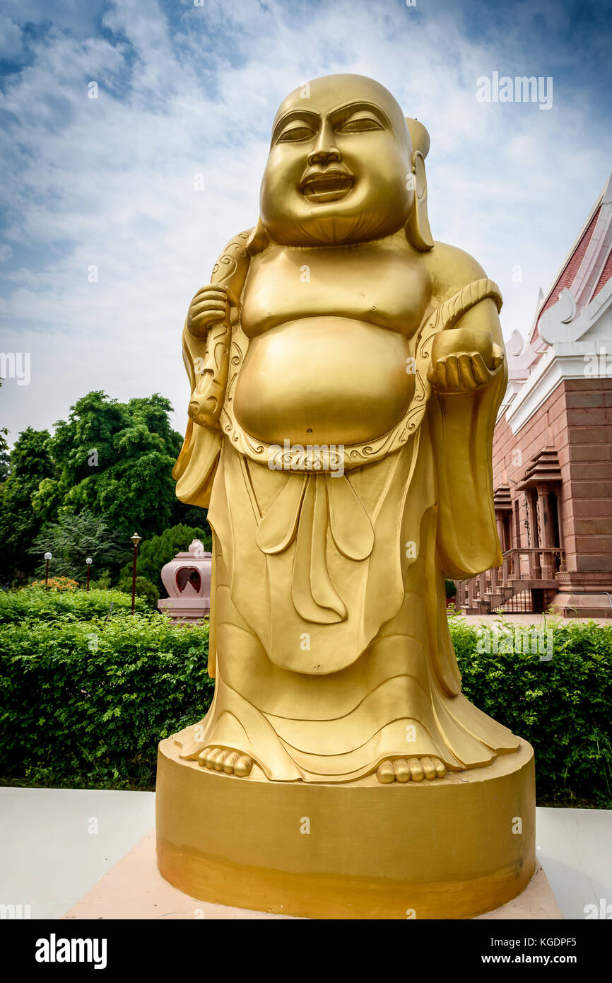 Laughing Buddha statue at a Buddhist monastery at Sarnath ...