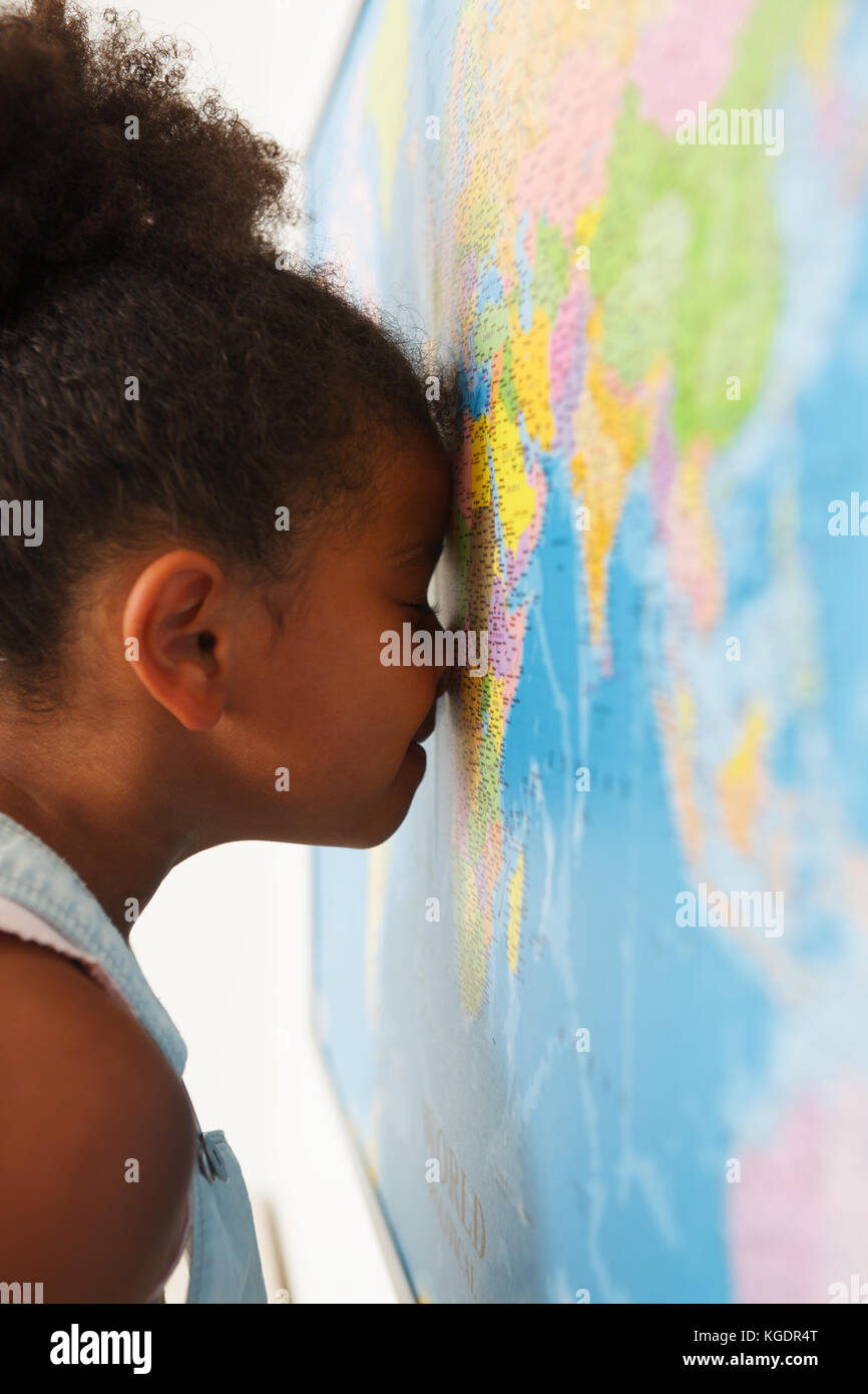 African american preschool girl near the map Stock Photo