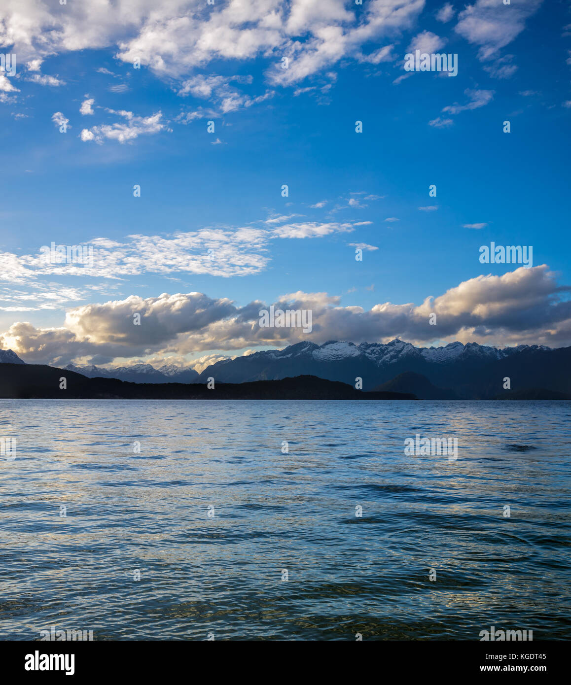 Moody sky with clouds over Lake Manapouri in the South Island of New ...