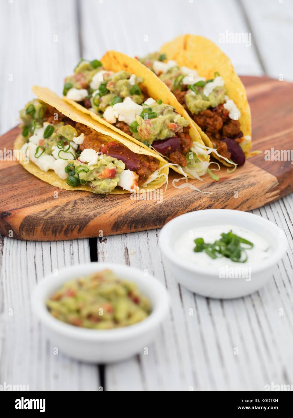 minced beef tacos on wood on grey background Stock Photo Alamy