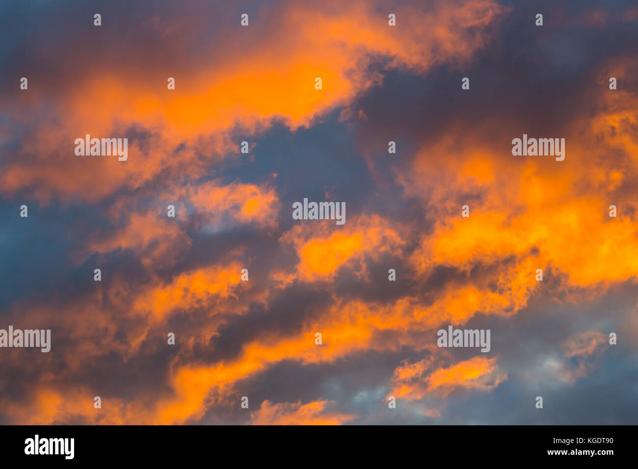 dramatic threatening natural colorful orange sky cloud formation Stock Photo