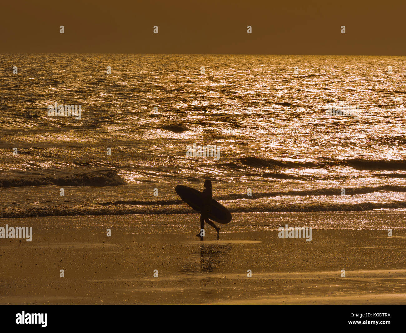 Surfers on Punta Umbria beach Huelva province, Region of Andalusia, Spain, Europe Stock Photo