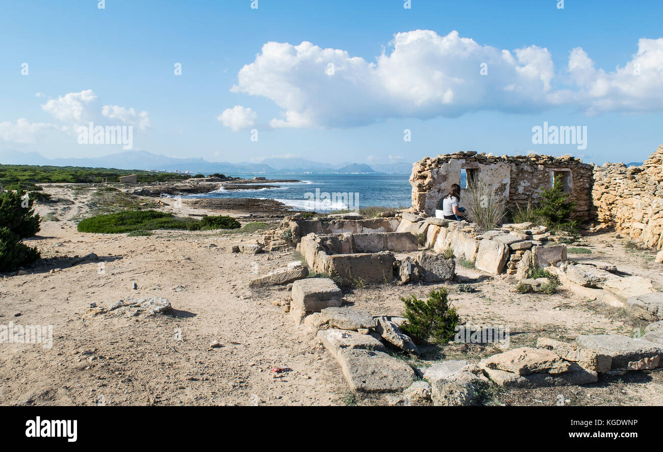 Young man hiking in wild Mallorca, Son Serra de Marina, Mallorca, Spain Stock Photo