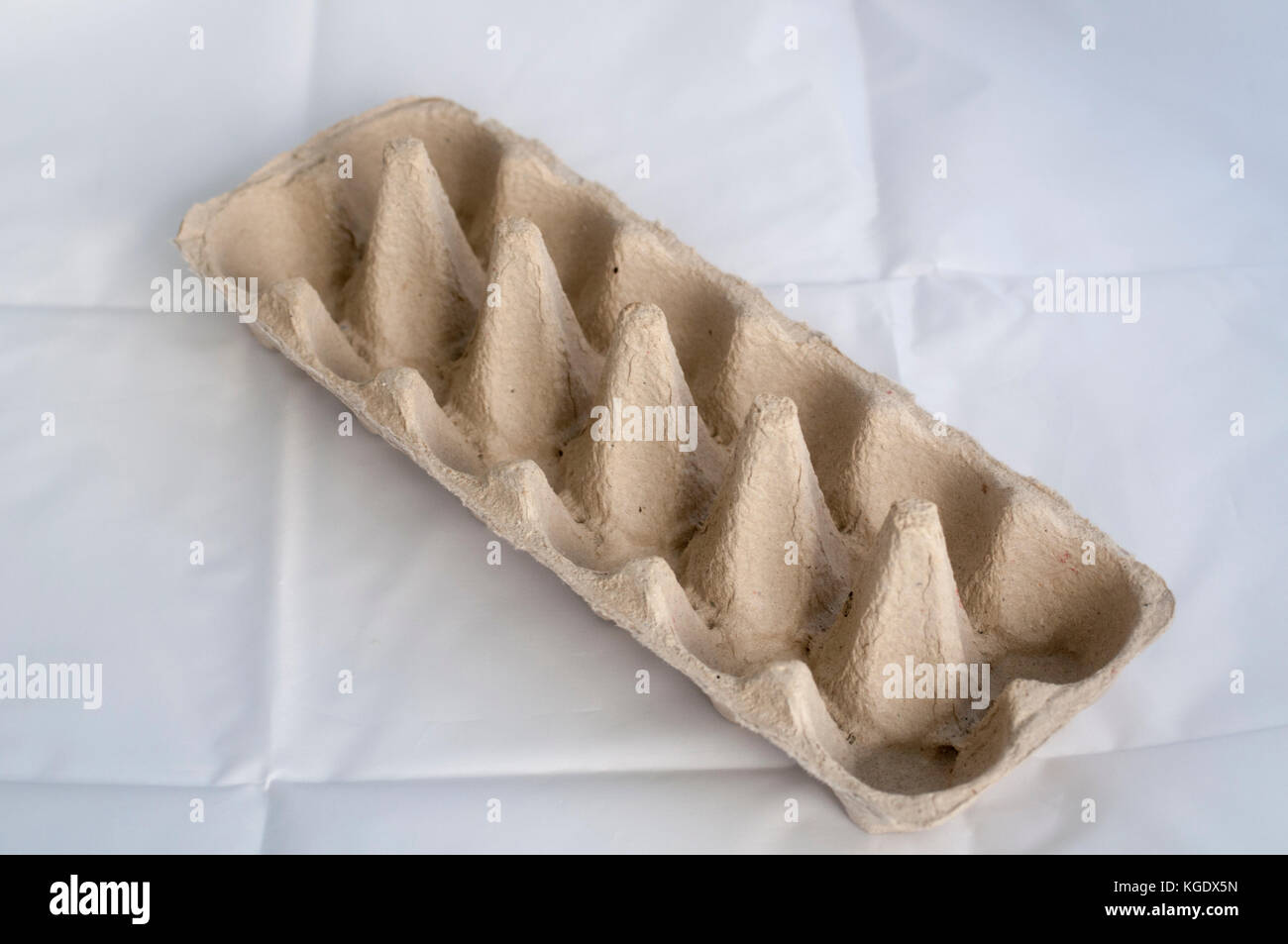 Empty cardboard egg tray for 12 eggs. made from recycled cardboard