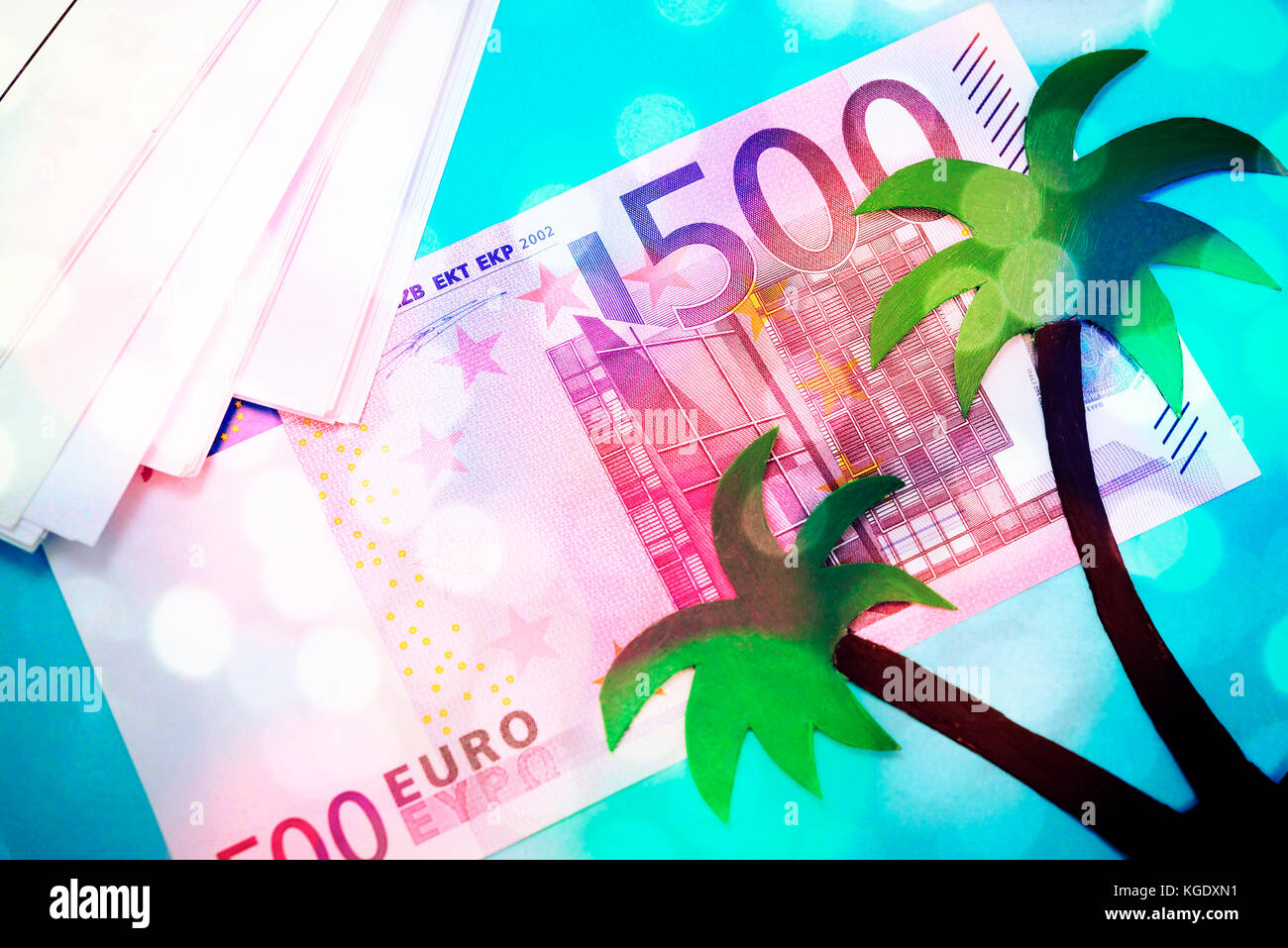 Paper palm tree on euro bill, paradise papers Stock Photo