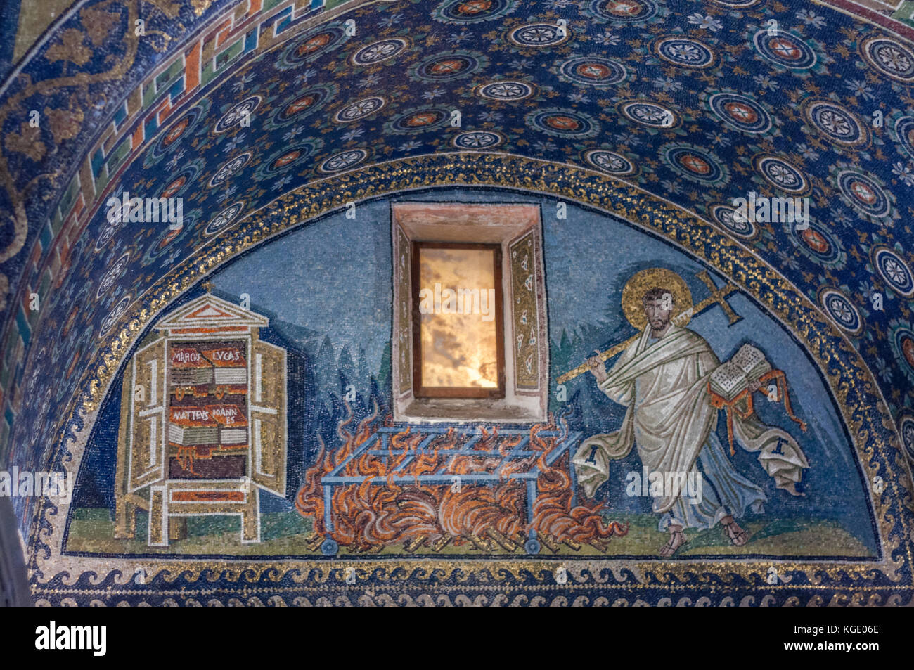 'Martyrdom of St. Lawrence' mosaic inside the Mausoleum of Galla Placidia, Ravenna.  Byzantine mosaic and the alabaster window panel. Stock Photo