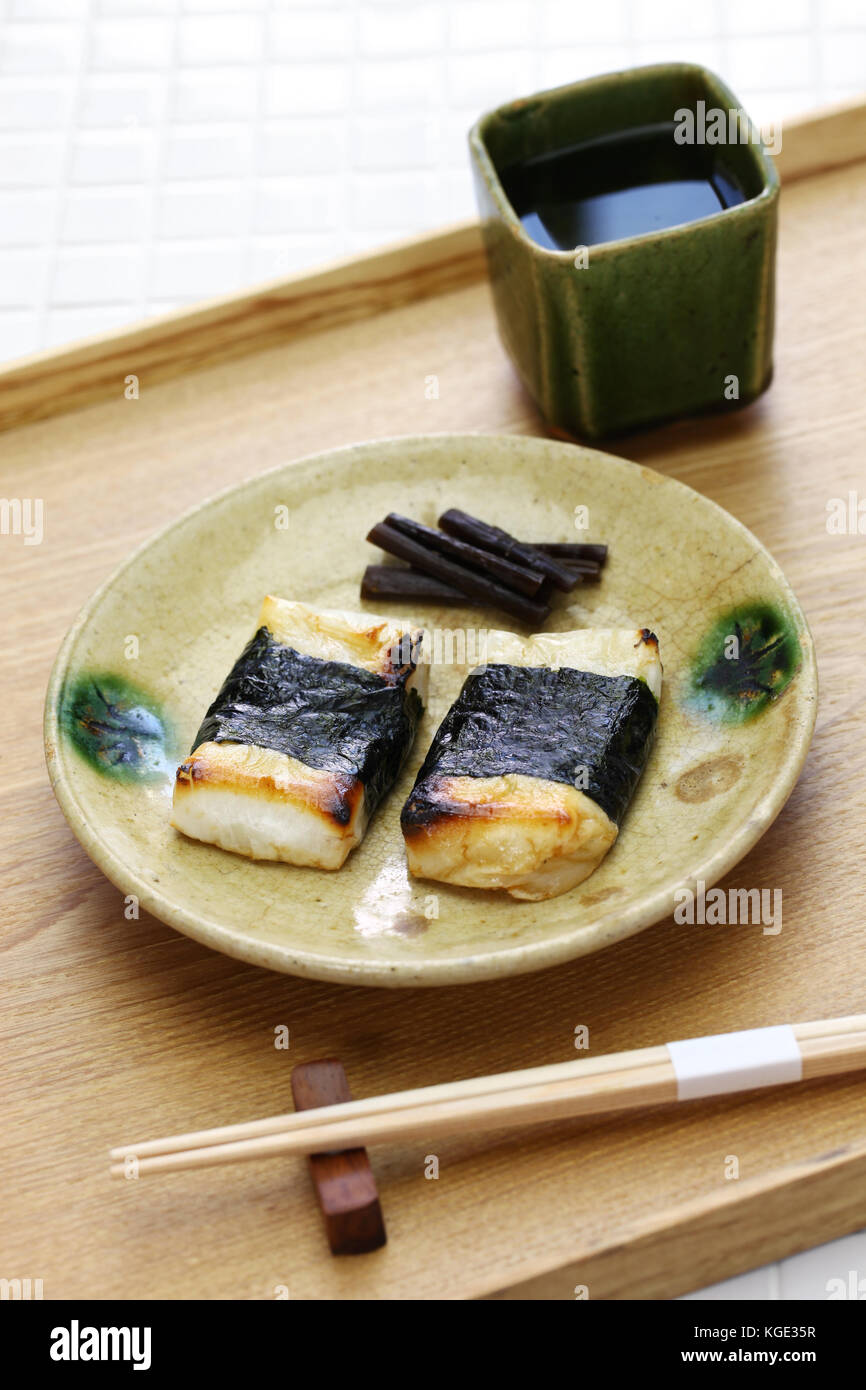 Isobeyaki, grilled mochi (japanese rice cake) wrapped in nori (seaweed), soy sauce taste Stock Photo