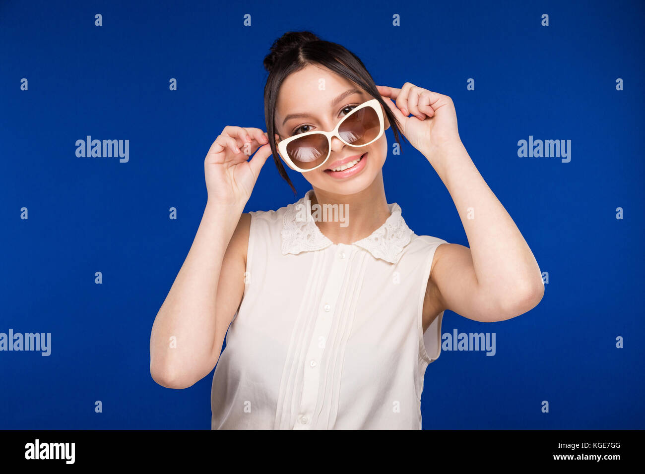 girl in sunglasses Stock Photo Alamy