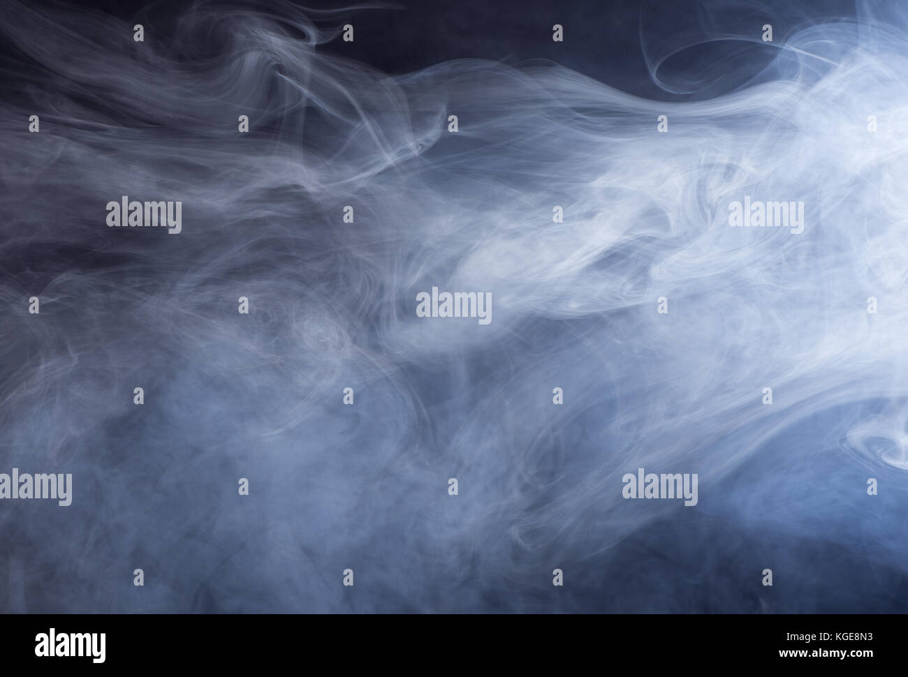 Swirling glowing smoke for an abstract background Stock Photo