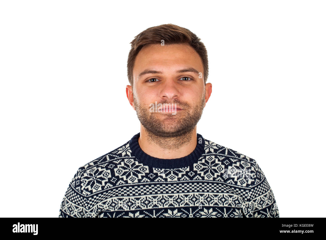 Portrait of a confident man wearing a christmas pullower on isolated background Stock Photo
