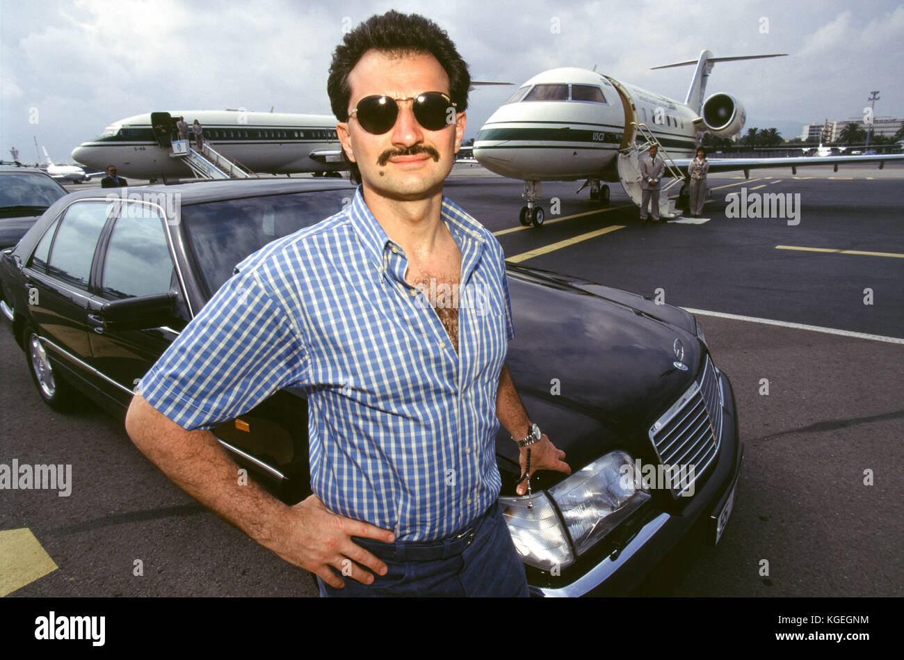 Saudi prince Al-Waleed Bin Talal bin Abdulaziz al Saud, businessman, investor and philanthropist, and member of the Saudi royal family, with his private jets and helicopter at Nice Airport where he summers with his children.  They stay on board his 'Kingdom 5KR', an 85-meter yacht, bought 'Trump Princess' from Donald Trump in the 1980s during his financial problems, who had in turn bought 'Nabila'  from Saudi arms dealer Khashoggi, during which time it appeared as the Flying Saucer in James Bond's 'Never Say Never Again', in Nice, France in 1997.  Al-Waleed was detained November 4th, 2017 in a Stock Photo