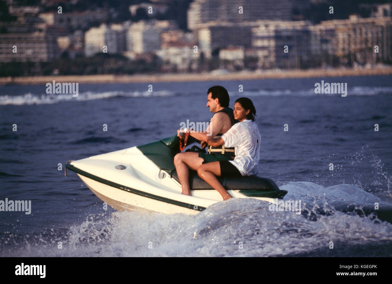 Saudi prince Al-Waleed Bin Talal bin Abdulaziz al Saud, businessman, investor and philanthropist, and member of the Saudi royal family, on summer holiday with children on board his 'Kingdom 5KR' 85-meter yacht, bought 'Trump Princess' from Donald Trump in the 1980s during his financial problems, who had in turn bought 'Nabila'  from Saudi arms dealer Khashoggi, during which time it appeared as the Flying Saucer in James Bond's 'Never Say Never Again', in Nice, France in 1997.  Al-Waleed was arrested November 4th, 2017 in an anti-corruption drive that included at least 10 other princes, four mi Stock Photo