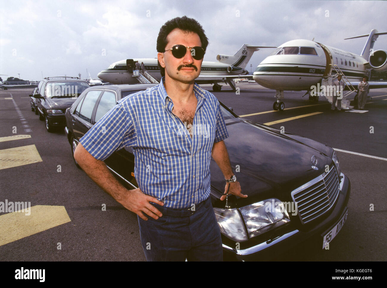 Saudi prince Al-Waleed Bin Talal bin Abdulaziz al Saud, businessman, investor and philanthropist, and member of the Saudi royal family, with his private jets and helicopter at Nice Airport where he summers with his children.  They stay on board his 'Kingdom 5KR', an 85-meter yacht, bought 'Trump Princess' from Donald Trump in the 1980s during his financial problems, who had in turn bought 'Nabila'  from Saudi arms dealer Khashoggi, during which time it appeared as the Flying Saucer in James Bond's 'Never Say Never Again', in Nice, France in 1997.  Al-Waleed was detained November 4th, 2017 in a Stock Photo