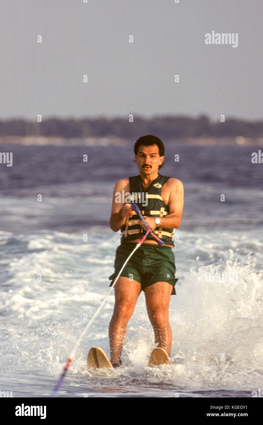 Saudi prince Al-Waleed Bin Talal bin Abdulaziz al Saud, businessman, investor and philanthropist, and member of the Saudi royal family, on summer holiday with children on board his 'Kingdom 5KR' 85-meter yacht, bought 'Trump Princess' from Donald Trump in the 1980s during his financial problems, who had in turn bought 'Nabila'  from Saudi arms dealer Khashoggi, during which time it appeared as the Flying Saucer in James Bond's 'Never Say Never Again', in Nice, France in 1997.  Al-Waleed was arrested November 4th, 2017 in an anti-corruption drive that included at least 10 other princes, four mi Stock Photo