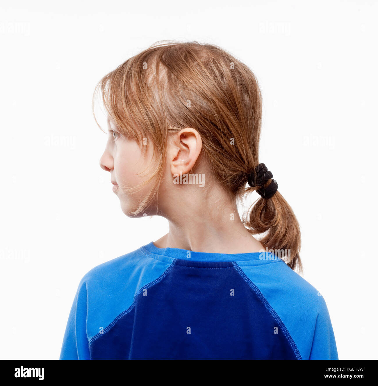 Boy with long hair ponytail hi-res stock photography and images - Alamy
