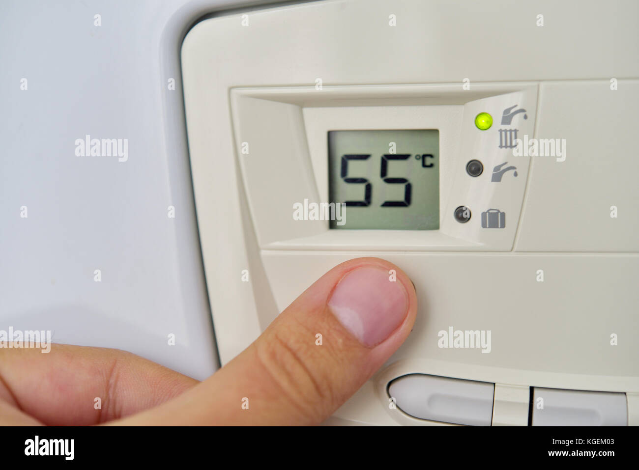Setting the central heating level in gas furnace panel Stock Photo Alamy