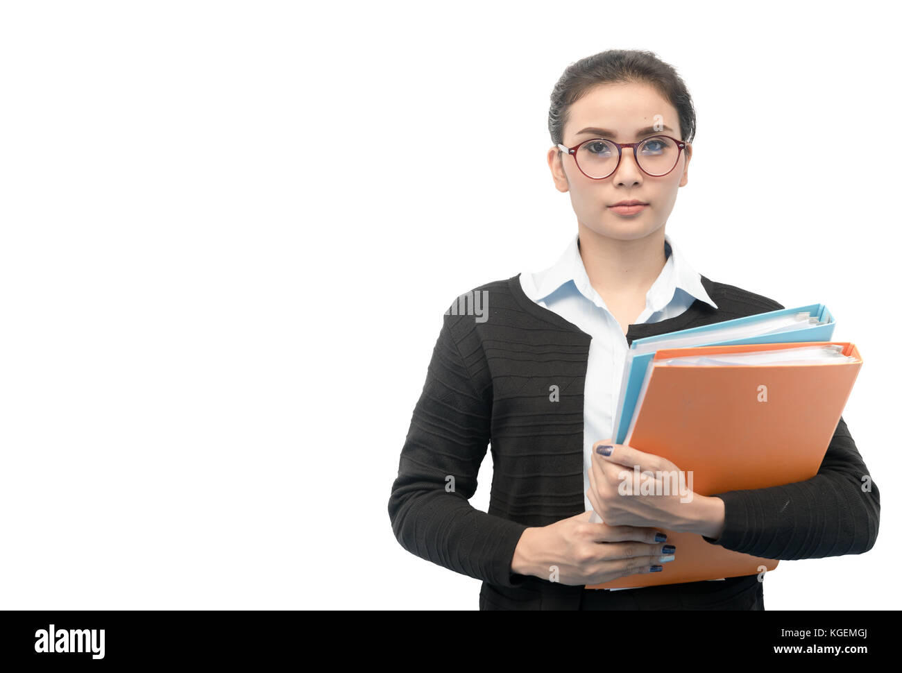 Close-up portrait of a young secretary female holding book file isolated on white background, ready for doing business task. Stock Photo