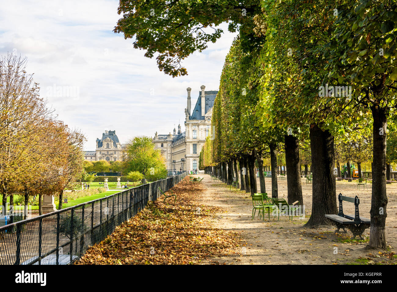 The Flore pavilion of the Louvre palace seen from the Tuileries garden in Paris, by a sunny autumn afternoon, with an alignment of linden trees, metal Stock Photo