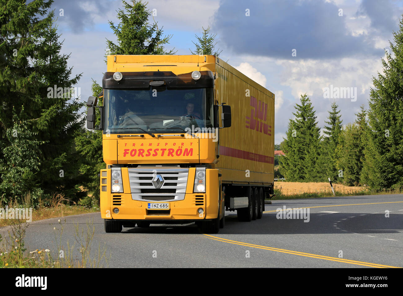 SALO, FINLAND - AUGUST 30, 2015: Yellow Renaut Magnum semi truck on the road. Renault Magnum was manufactured in 1990-2013 and it received the Interna Stock Photo