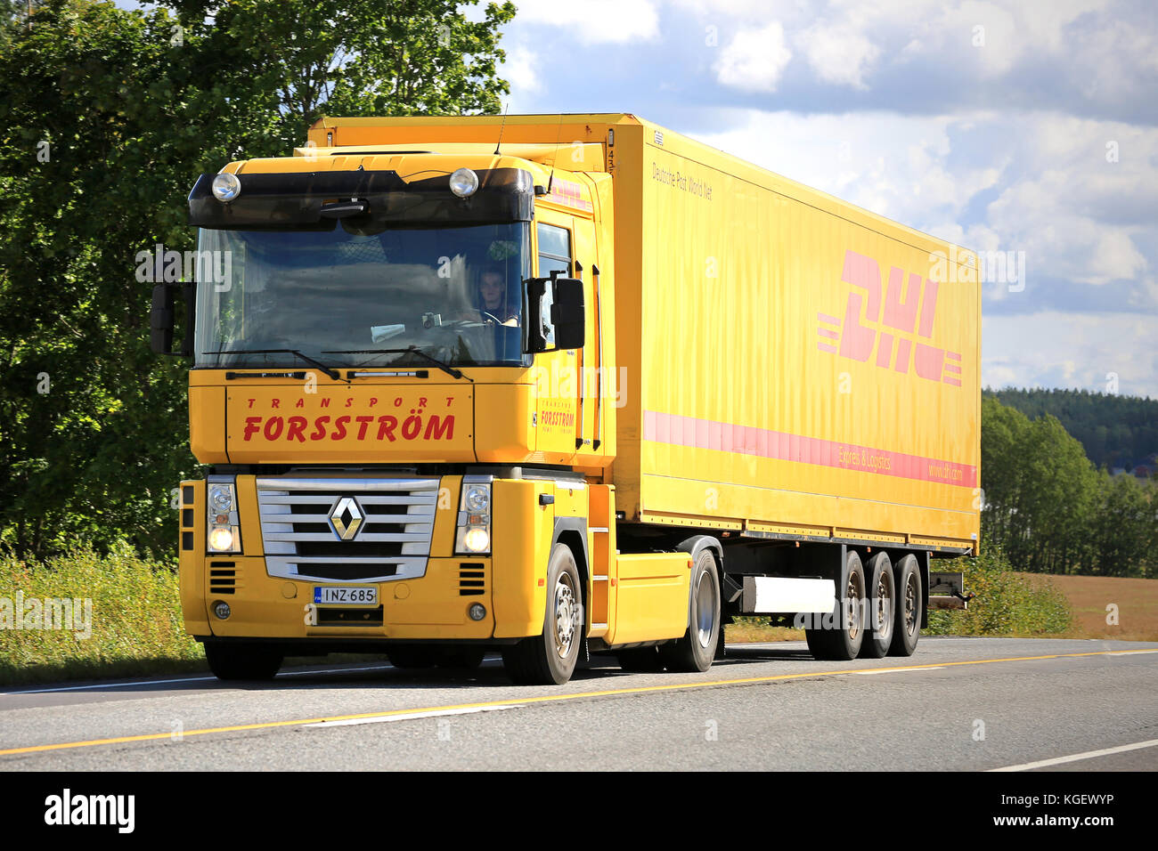 SALO, FINLAND - AUGUST 30, 2015: Yellow Renaut Magnum semi truck on the road. Renault Magnum was manufactured in 1990-2013 and it received the Interna Stock Photo
