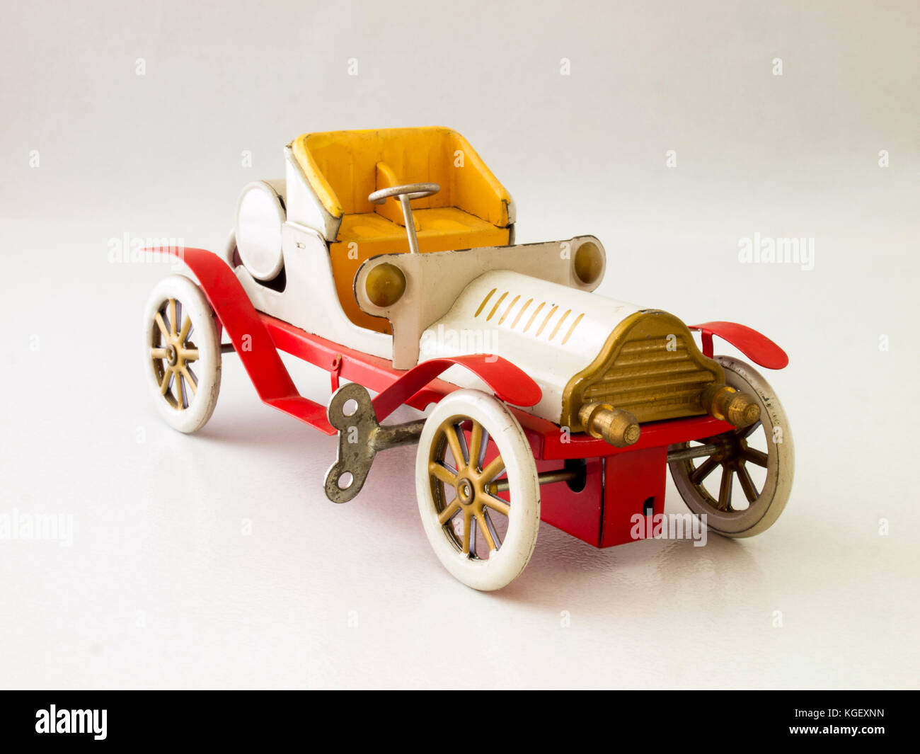 Antique car tin toy / Isolated white Stock Photo - Alamy