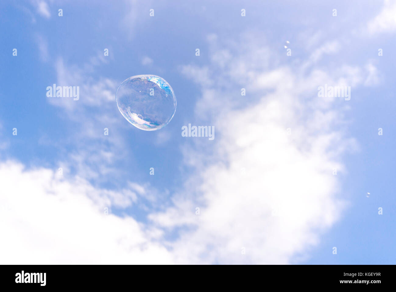 Soap bubble on the blue sky background Stock Photo - Alamy