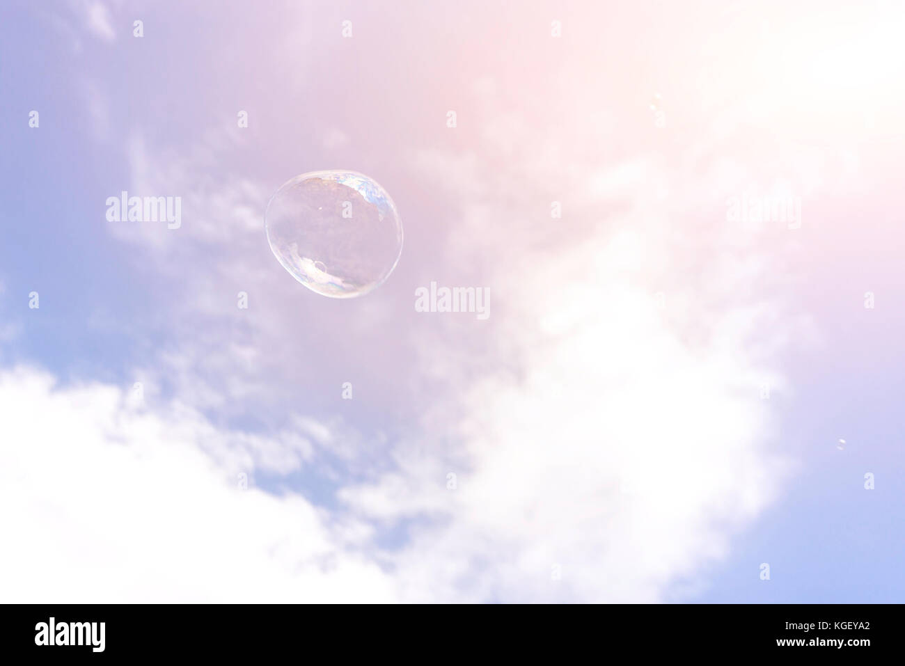 Soap bubble on the blue sky background Stock Photo - Alamy