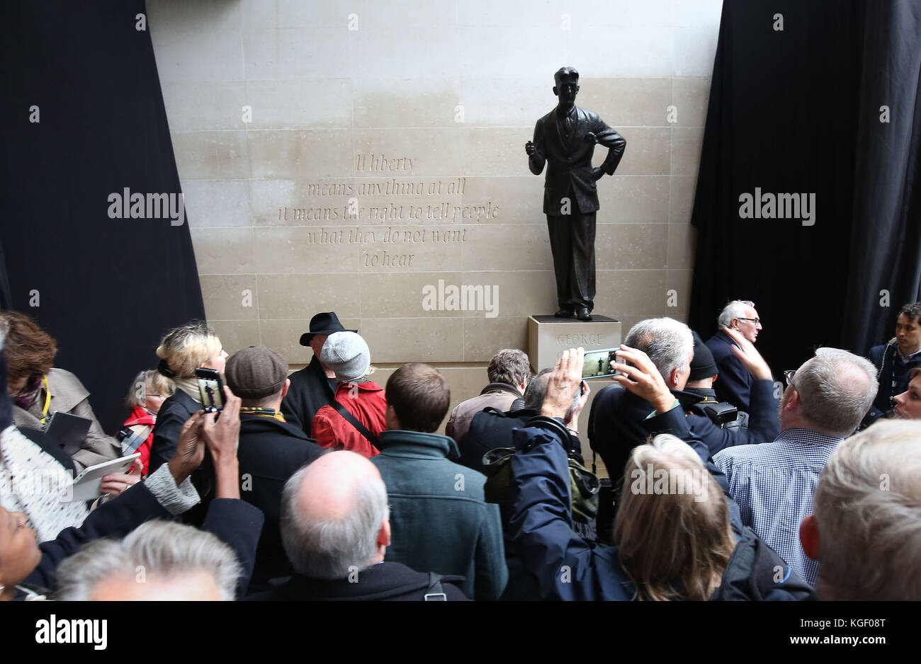 People at the unveiling of a bronze statue of Orwell outside BBC