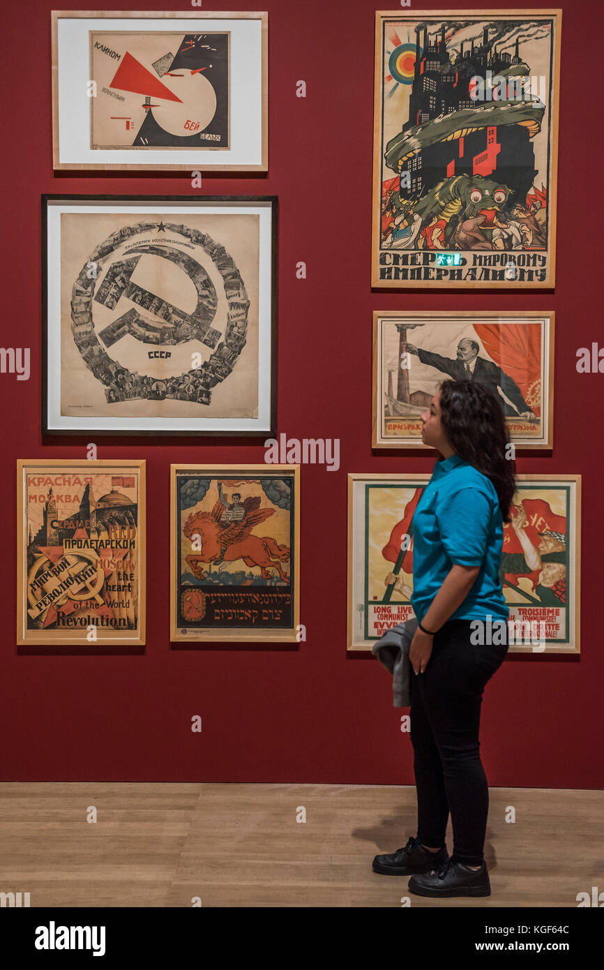 London, UK. 7th Nov, 2017. Pupils from Thomas Tallis School in Kidbrooke who are doing Russian studies, visit the exhibition in Room 1 - Tate Modern's new exhibition Red Star Over Russia on the 100th anniversary of the October Revolution. The exhibition offers a visual history of the Soviet Union, revealing how seismic political events inspired a wave of innovation in art and graphic design. Featuring over 250 posters, paintings and photographs, many on public display for the first time. Credit: Guy Bell/Alamy Live News Stock Photo