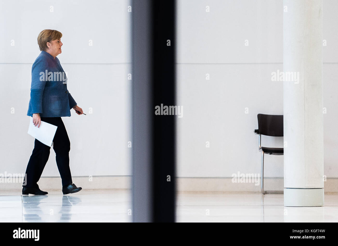 Berlin, Germany. 07th Nov, 2017. German Chancellor Angela Merkel walking in the Bundestag (Federal Legislature) after a further round of the ongoing exploratory talks by the CDU, CSU, FDP and Alliance 90/The Greens in Berlin, Germany, 07 November 2017. Credit: Silas Stein/dpa/Alamy Live News Stock Photo