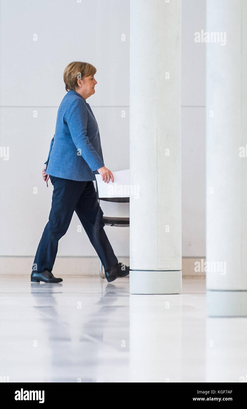 Berlin, Germany. 07th Nov, 2017. German Chancellor Angela Merkel walking in the Bundestag (Federal Legislature) after a further round of the ongoing exploratory talks by the CDU, CSU, FDP and Alliance 90/The Greens in Berlin, Germany, 07 November 2017. Credit: Silas Stein/dpa/Alamy Live News Stock Photo