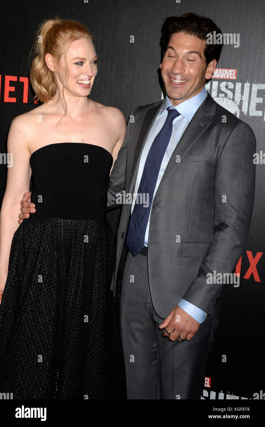 Deborah Ann Woll and Jon Bernthal attend the Netfilx TV serious premiere of 'The Punisher' at AMC Loews on November 6, 2017 in New York City. Stock Photo