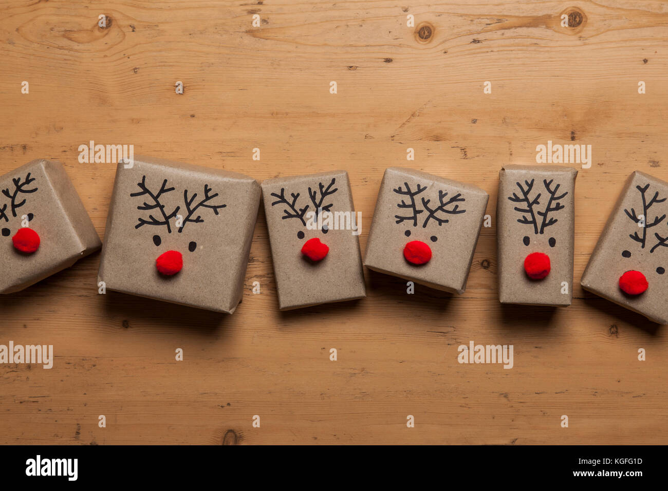 Christmas gift boxes with reindeer faces Stock Photo