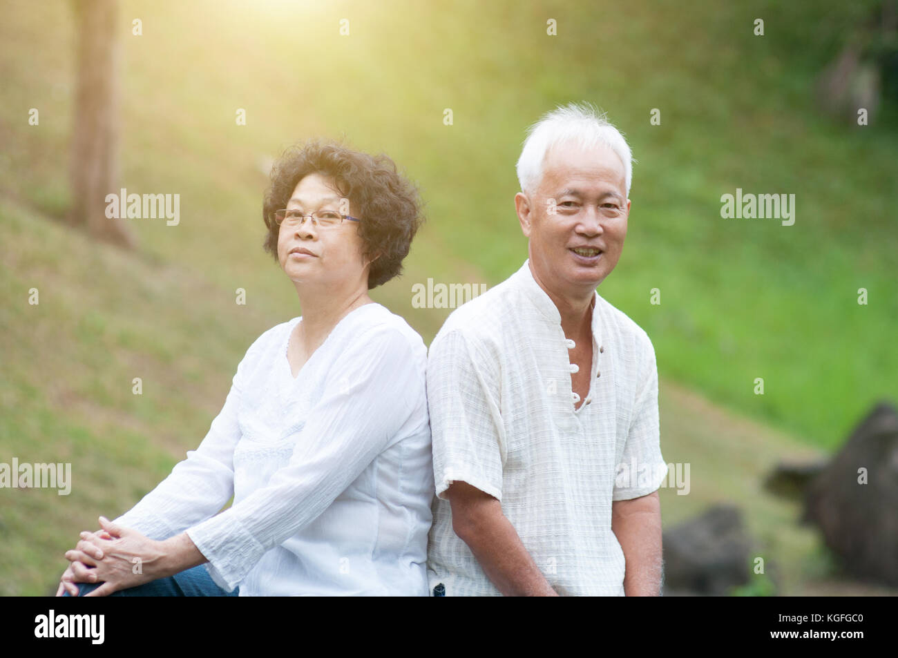 Happy Asian senior couple relaxing at outdoor park Stock Photo - Alamy